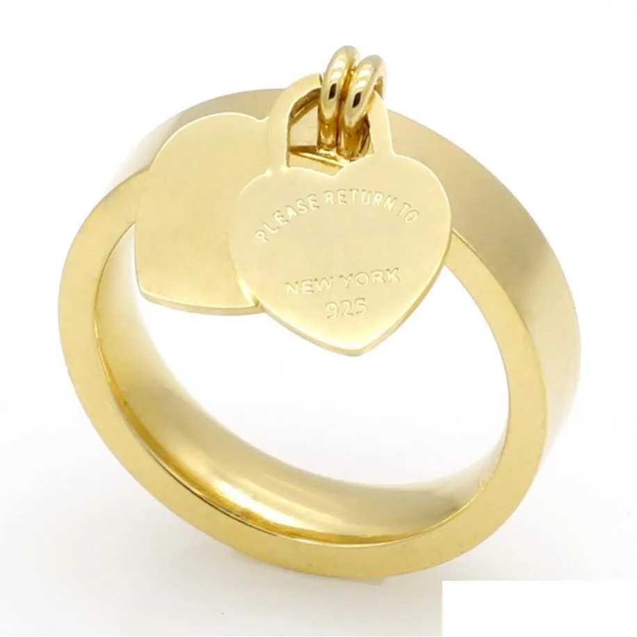 Bandringe Fashion Schmuck 316L Titanium Gold plattiert herzförmige T-Buchstaben Doppelte Herz Ring Frauen für Frau Drop Lieferung OT1TX