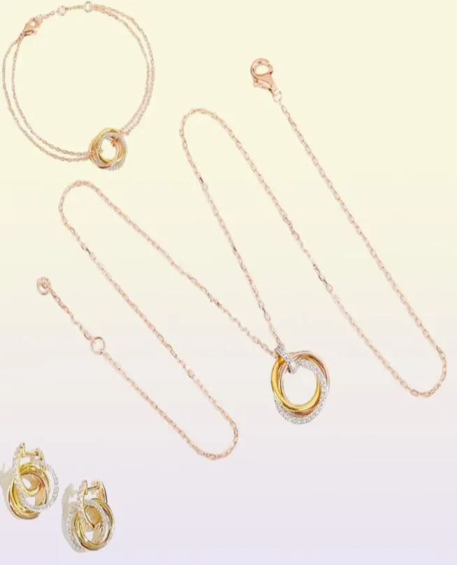 Europa America Fashion Necklace Bracelet oorbellen Lady Vrouwen Brass gegraveerde briefinstellingen Pink Diamond Drie cirkels Hanger 18K9538237