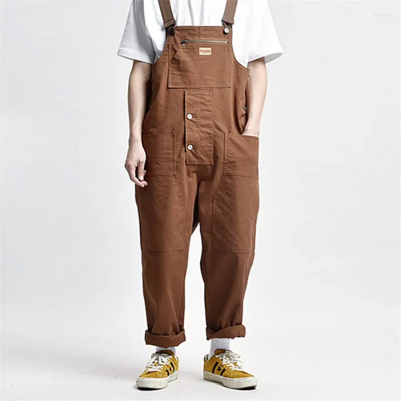 Herrbyxor 2024 jumpsuit casual streetwear retro fasta färg overall multi-pocket löst hängslen på baggy arbete slitage last