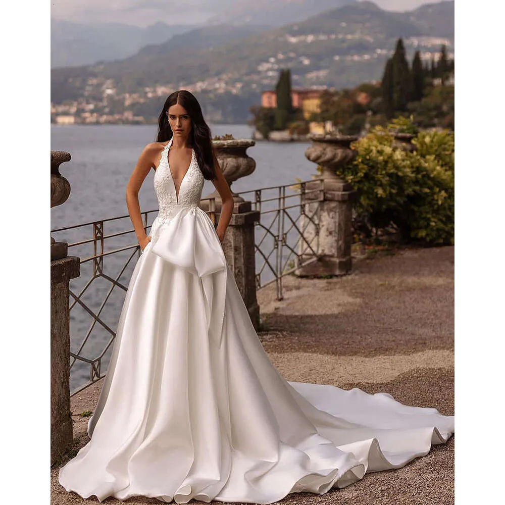 Linia eleganckie sukienki boho kantarki aplikacje szyi bez pleców sukienki ślubne kobiety białe sukienki ślubne vestidos de novia