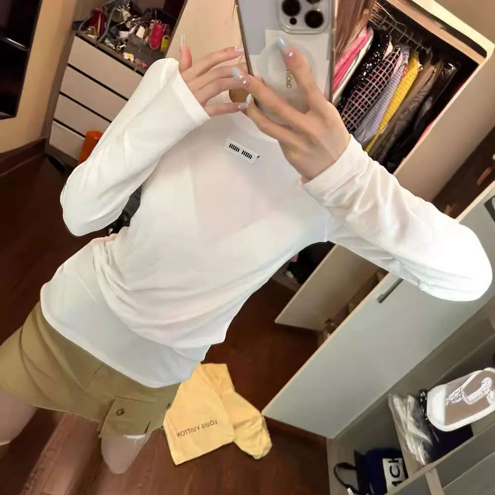Designer MM Family 24SS New Tiansi Long T-Shirt mit Briefstickdekoration