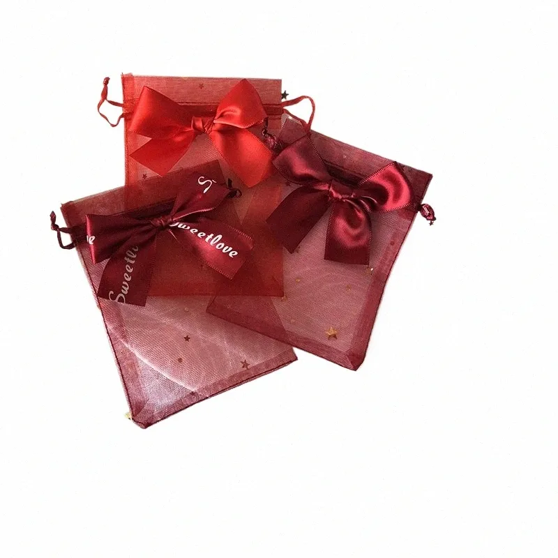 10pcs Bijoux Packaging Sac Mesh Organza DrawString Bowknot Pearl Yarn Sacs Mariage Candons Candons Sac de rangement Sac de rangement Nouveau FI X04Z #