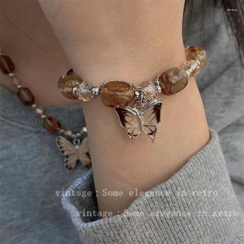 Colliers pendants Collier de papillon rétro à double couches pour les copines de niche femelles accessoires à la main à la mode