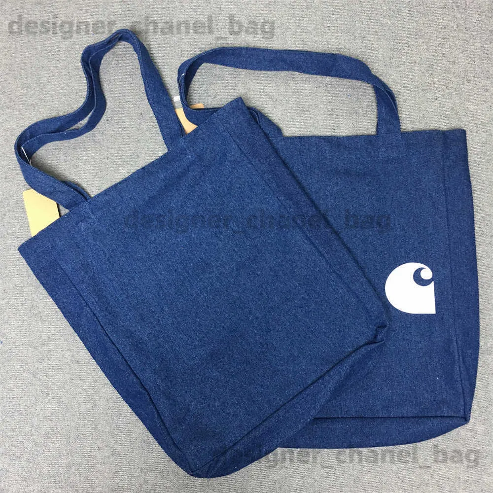 Totes Hot selling trend AP denim bag single shoulder handbag co branded mens and womens casual canvas bag shopping bag T240416