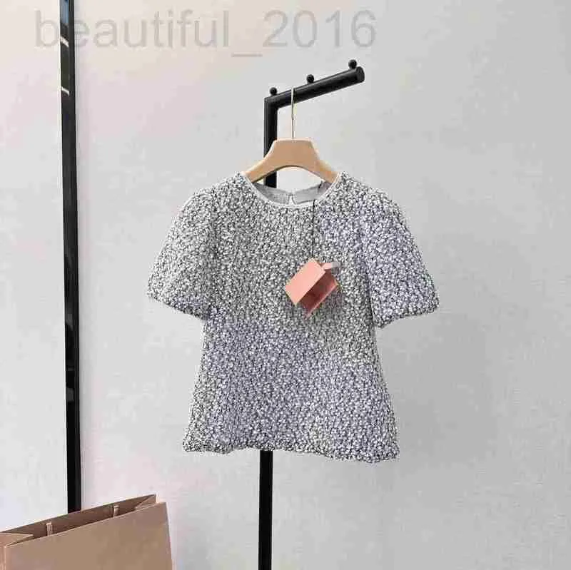 Kvinnors T-shirtdesigner Shenzhen Nanyou 24 Early Spring Style Elegant och glittrande broderad rund hals med Diamond Letter Splice Bubble Sleeve Top for Women HQB