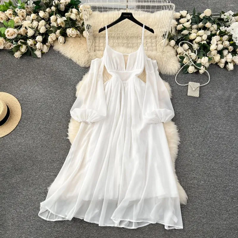 Casual klänningar Foamlina Beach Vacation Dress for Women Fashion Spring French Bubble Sleeves Hollowed Out Backless White