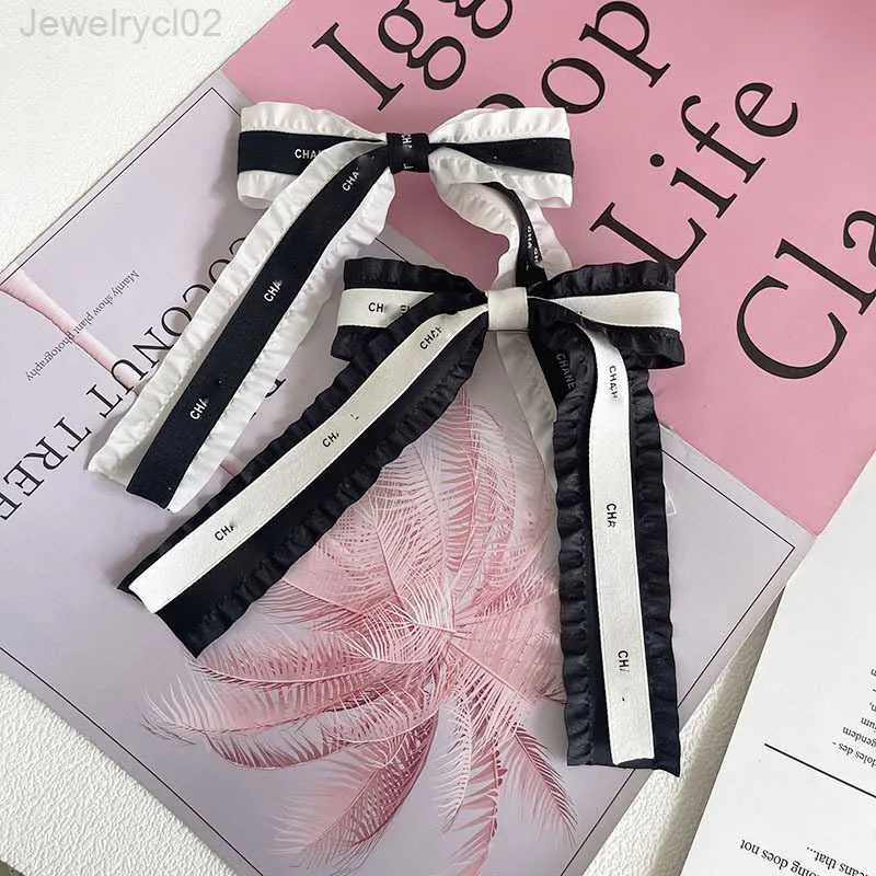 Julklapp designer Barrettes Girls Hairpin Classic Letter Hair Clips Luxury Hairlips Fashion Women Bow pannband Tillbehör Hög kvalitetszlsw