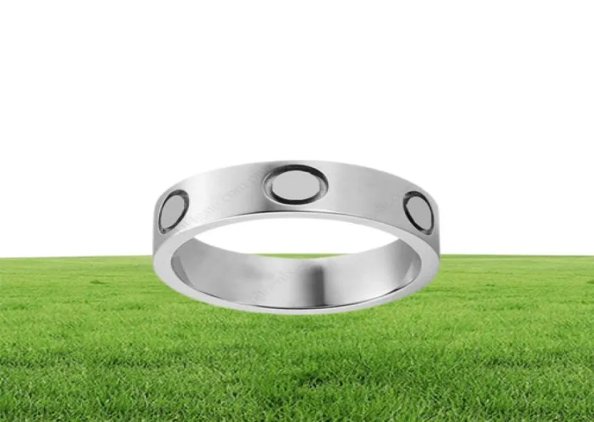 Design de haute qualité Design Titanium Steel Couple Band Rings for Men and Women Men039s Promed Wedding Rings Cadeaux de vacances1998041