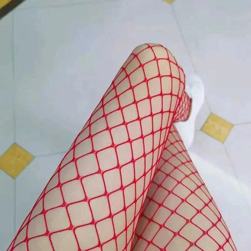 Sexiga strumpor White Red Black Sexy Women High midja Fishnet Stocking Fishnet Club Tights Panty Knitting Net Pantyhose Trouser Mesh Lingerie 240416