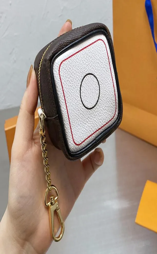 Cube Zipper Wallet Design de luxo de letra clássica de impressão de dados bolsa de moedas com fivela de fivela unissex marrom mini bolsas fofas pinging3752126