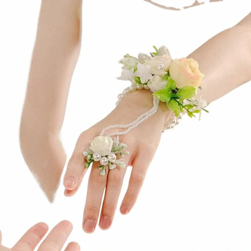 NIEUWE VROUWEN POLES CORSAGE MET PEARL ARTICIAAL ROSE HAND FR Decor Handgemaakte bruidsmeisje Bracelet Elegante bruiloftsaanbod Q2FP#