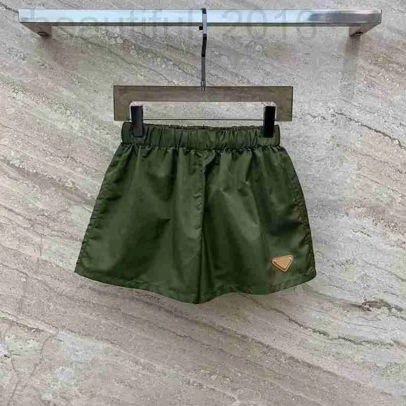 Kvinnors shorts designer nanyou zhi 24 tidigt vår ny mode triangel bokstav avslappnad byxor klassisk elastisk midja nylon vik mångsidig 02da