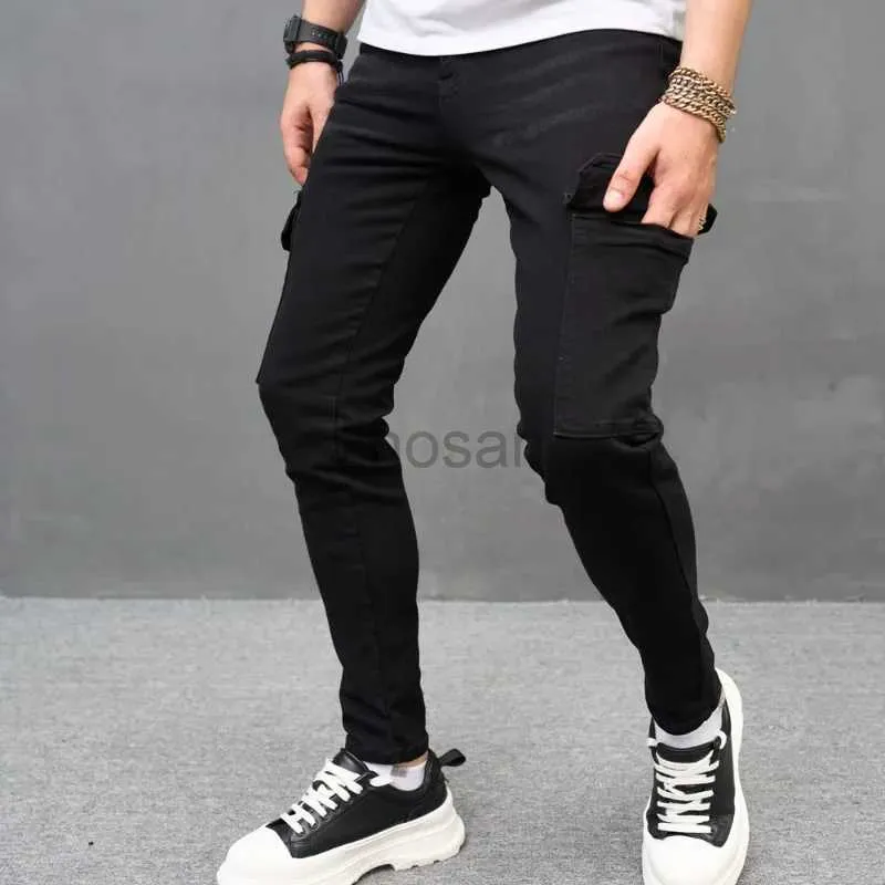 Мужские джинсы 2024 Новые черные стройные мужские грузовые брюки мода хип -хоп уличная одежда мужская работа носить карманные джинсовые брюки D240417