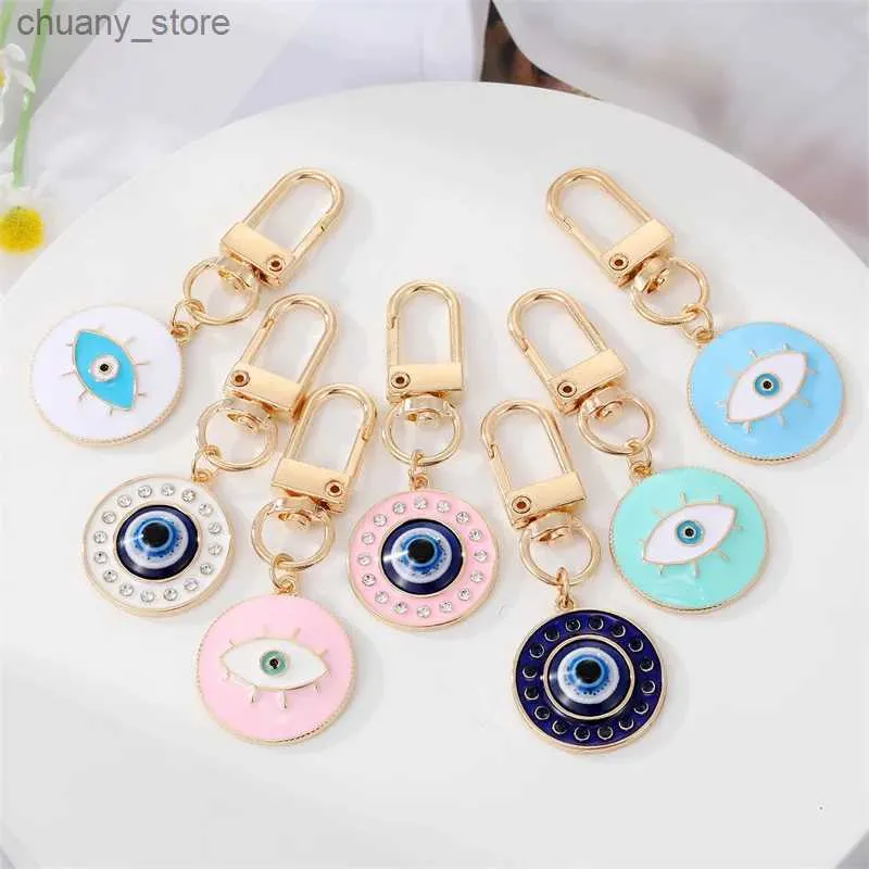 Keychains Lanyards 1 Round Evil Eye Keychain Ami Cavyring Bohemian Blue Eye Sac voiture AirPods Boîte clé Téléphone Charme Accessoire Jewelry Y240417