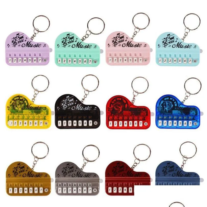 Autres fournitures de fête de fête d'autres fournitures de fête de fête mini piano keychain d'instrument de musique portable jouet keyring key electronic key dhidx