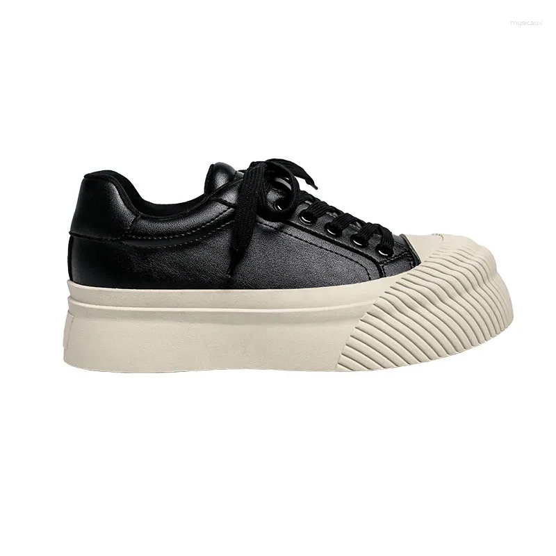 Chaussures décontractées Femmes célèbres Sneakers de loisirs Couleur continue à lacets confortables Super tendance noire et blanc pour la chaussure d'orteil rond à fond épais femmes