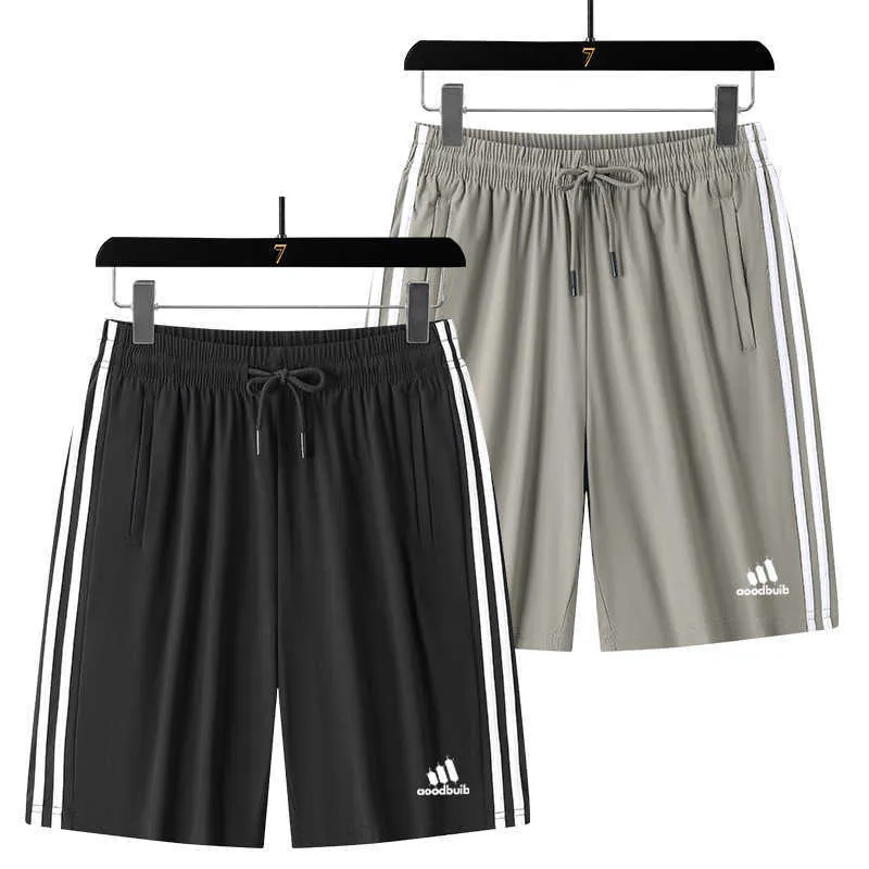 Лето мужские эластичные шелковые шорты негабаритные и увеличенные спортивные спортивные тренды пляжных брюк Capris