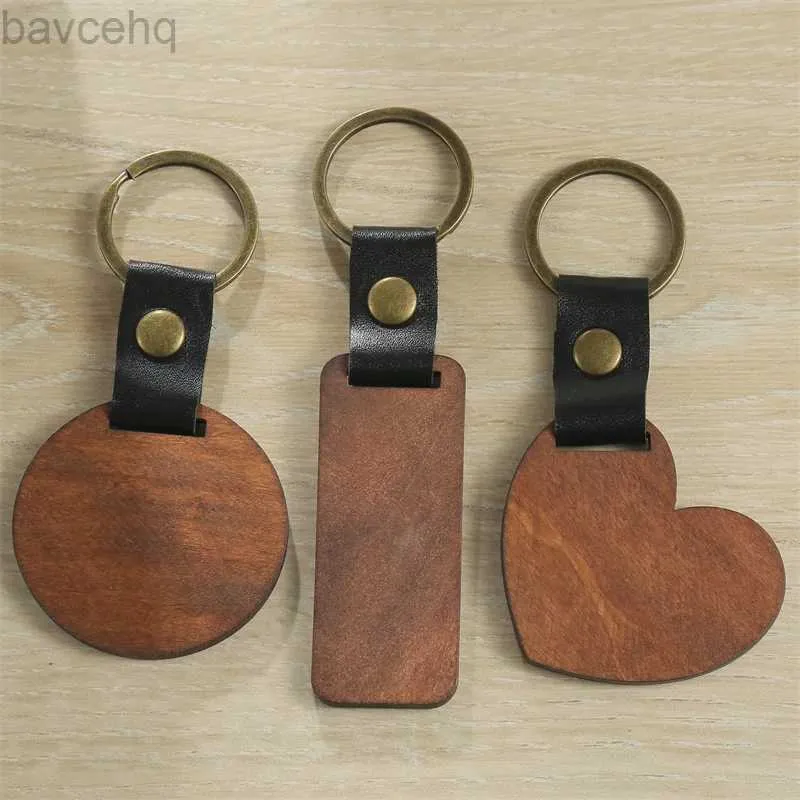 Tornari percorsi in legno PU Leather Keychain per uomini Donne Torchia a sospensione rotonda a forma di cuore per le chiavi Accessori per gioielli D240417