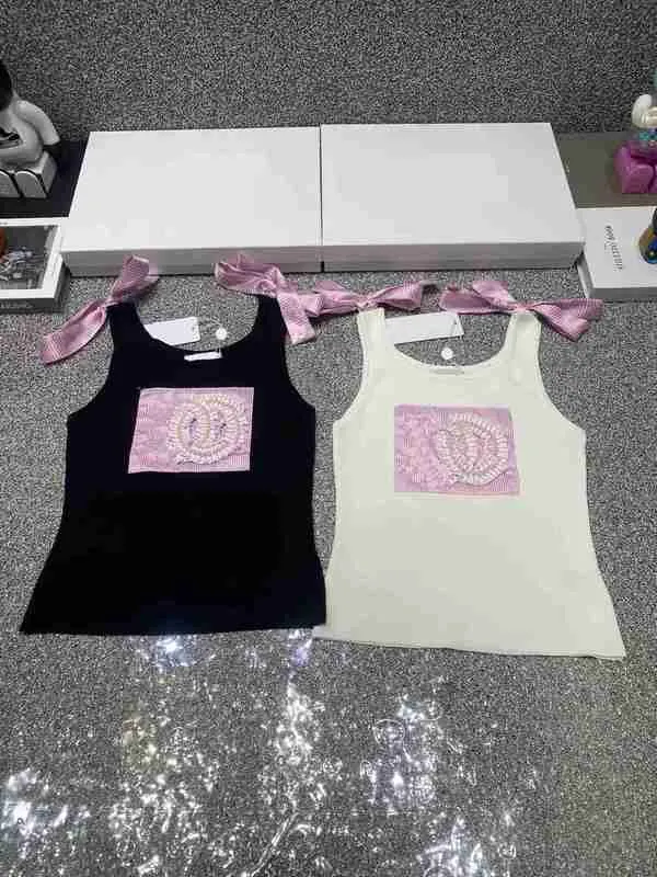 Damestanks Camis Designer Sweet Bow 2024 Nieuwe zomerbrei peer mouwloze letter vest mode ronde nek tops o6l5