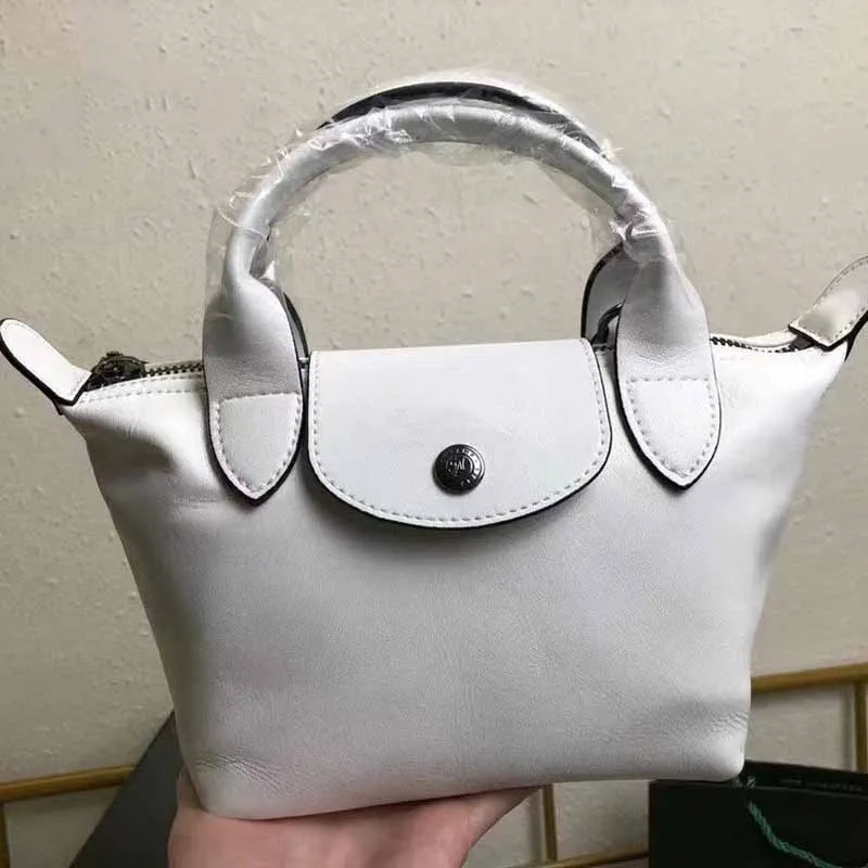 långa designers tygväskor lyx märkta kvinnor handväska bärbar dumpling väska märke damer högkvalitativa bärbara strand resor nylon axel casualbag