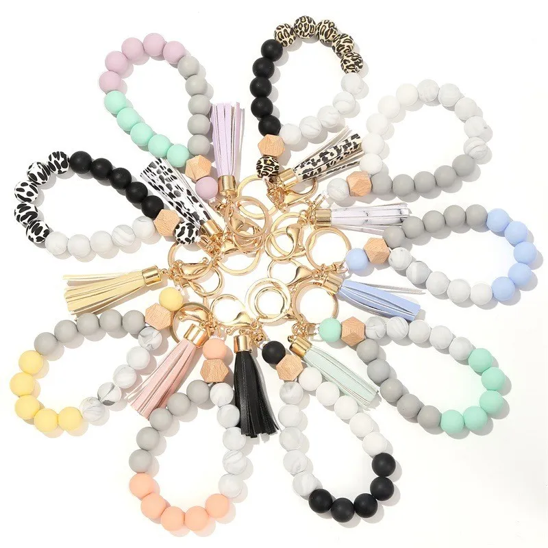 2024 New food grade silicone bead bracelet Wooden bead bracelet key chain PU fringe anti-loss key ring bracelet