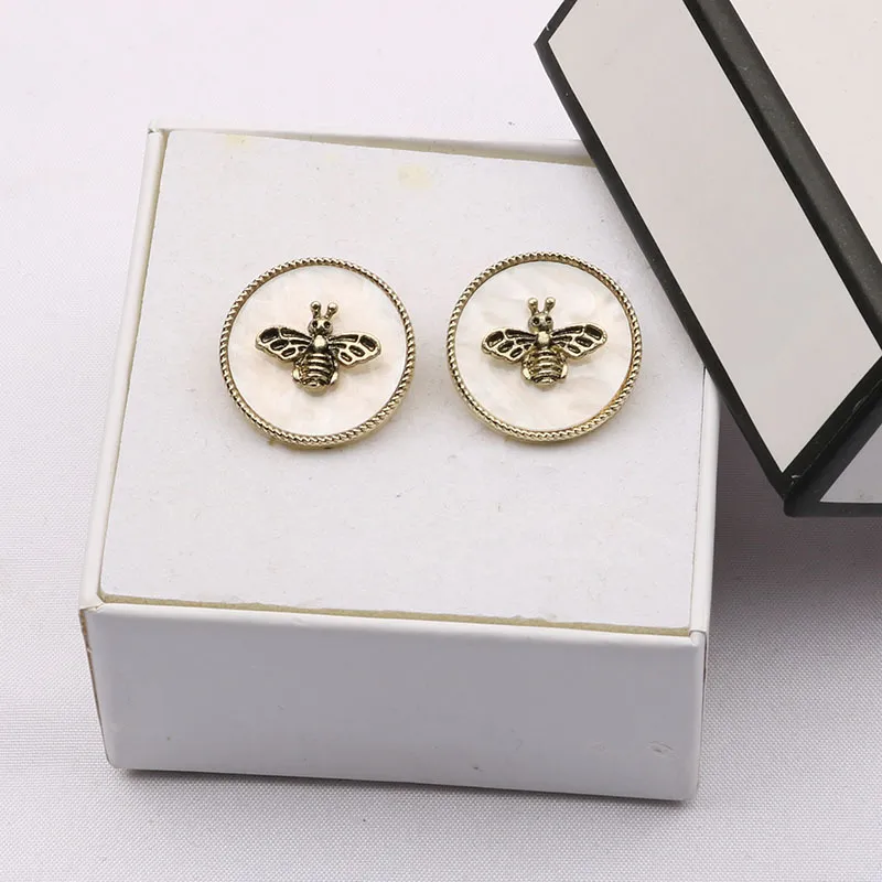 Fashion crossover round bee acrylic earrings for women Europe and the United States new creative personalized alloy earrings