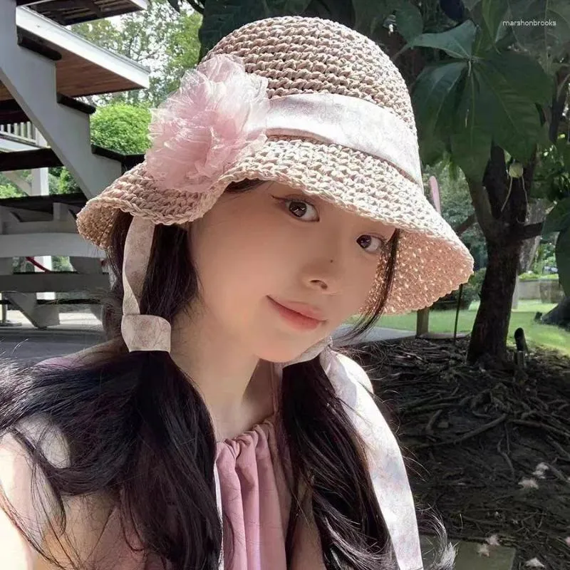 Breda brim hattar koreansk version band blommor strå hatt kvinnors vår sommarsjöns semester strand stor hopfällbar söt sol mössa