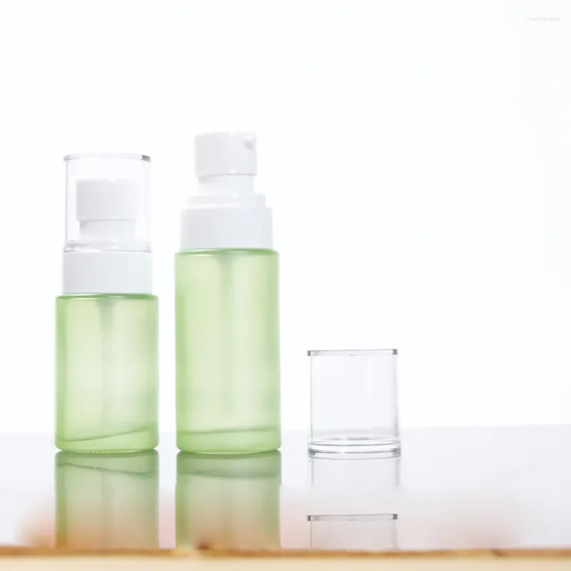 Bottiglie di stoccaggio ridotto mini bottiglia spray da 20 ml di vetro con pompa di lozione Essence profumo fiale da viaggio
