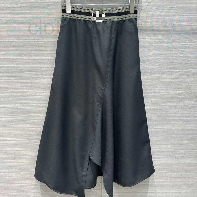 Skirts Designer Half skirt 2024 early spring new fashionable and simple irregular hem patchwork woven belt half skirt 1ANE