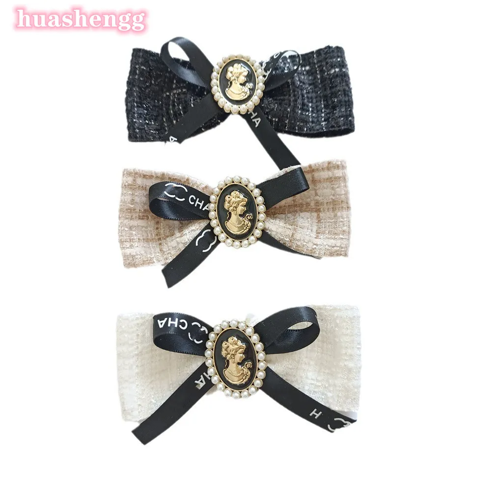 Designer pet dog hairpin classic logo bow 3 colors hairpin accessories cute sweet bear yorkshire marquis teddy corgi cat clip hair accessories Ornaments