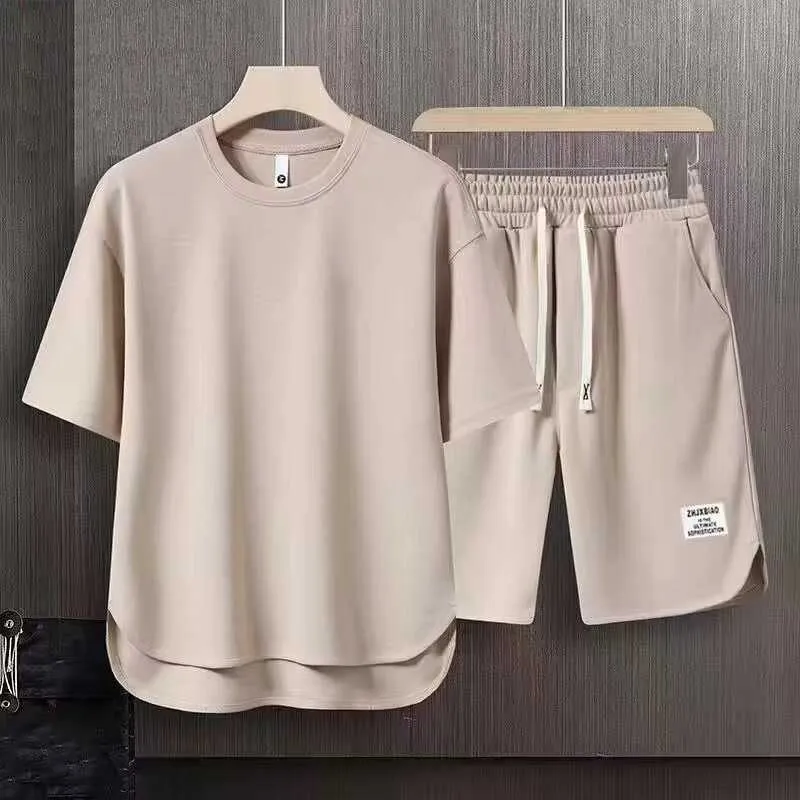 Fritidsportuppsättning för män sommaren trendiga varumärke Löst och enkla korta ärm shorts i kombination med en stilig kläder