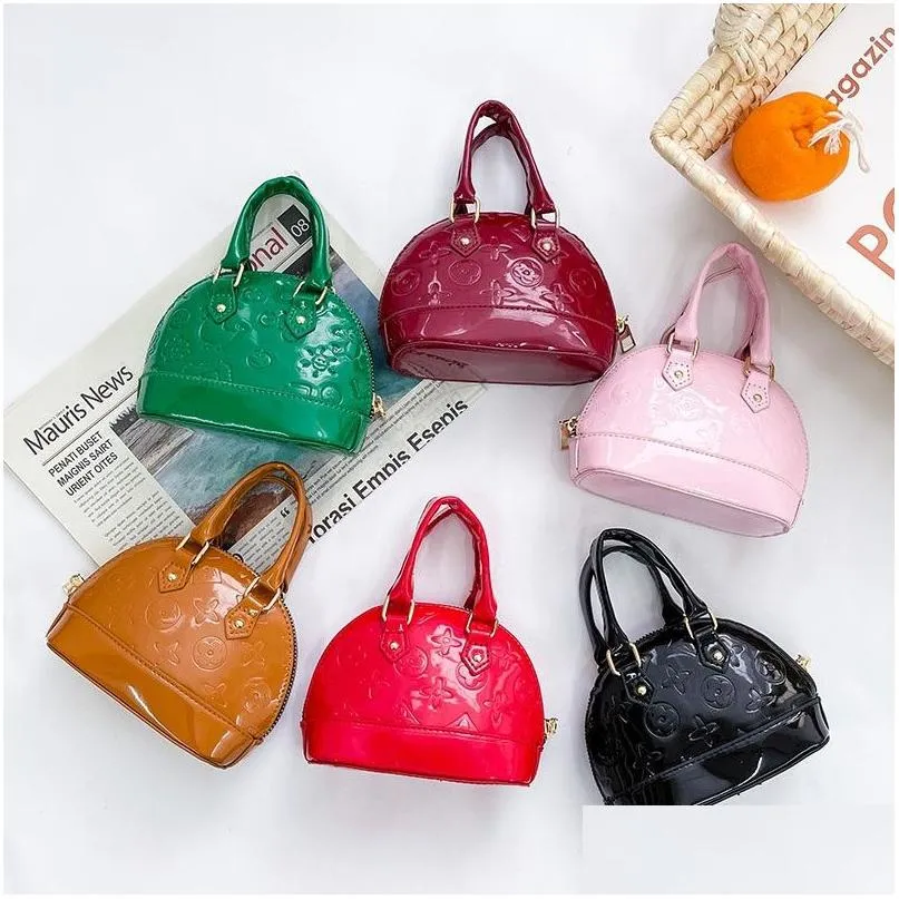 Torebki Dzieci Kwiat 2022 Projektanci Mini Shell Torby Cute Baby Girls Łańcuchy Crossbody Bag Zero Portfel F1158 Drop dostarczenie Matern OTY8M