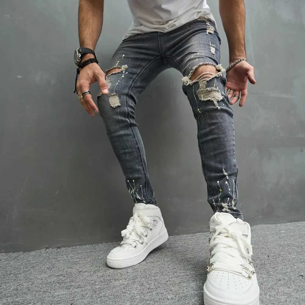4W4m män jeans rippade magra män blyertsbyxor stilfulla hiphop -speckle bläck tryckta hål nödställda stretch denim byxor för herr d240417