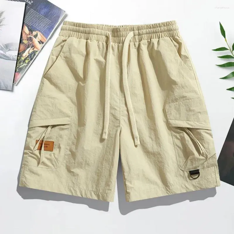 Shorts masculinos homens cargas versáteis de cor sólida com cintura ajustável vários bolsos para moda de verão no estilo de rua