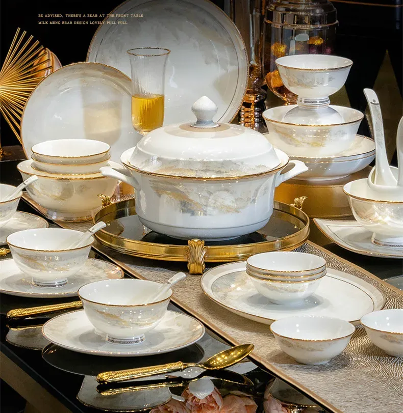 Setzt Luxusgold -Randgeschirr unter glaze künstlerische Landschaftsmuster Bone China Abendessen Set Keramik weißes Geschirr