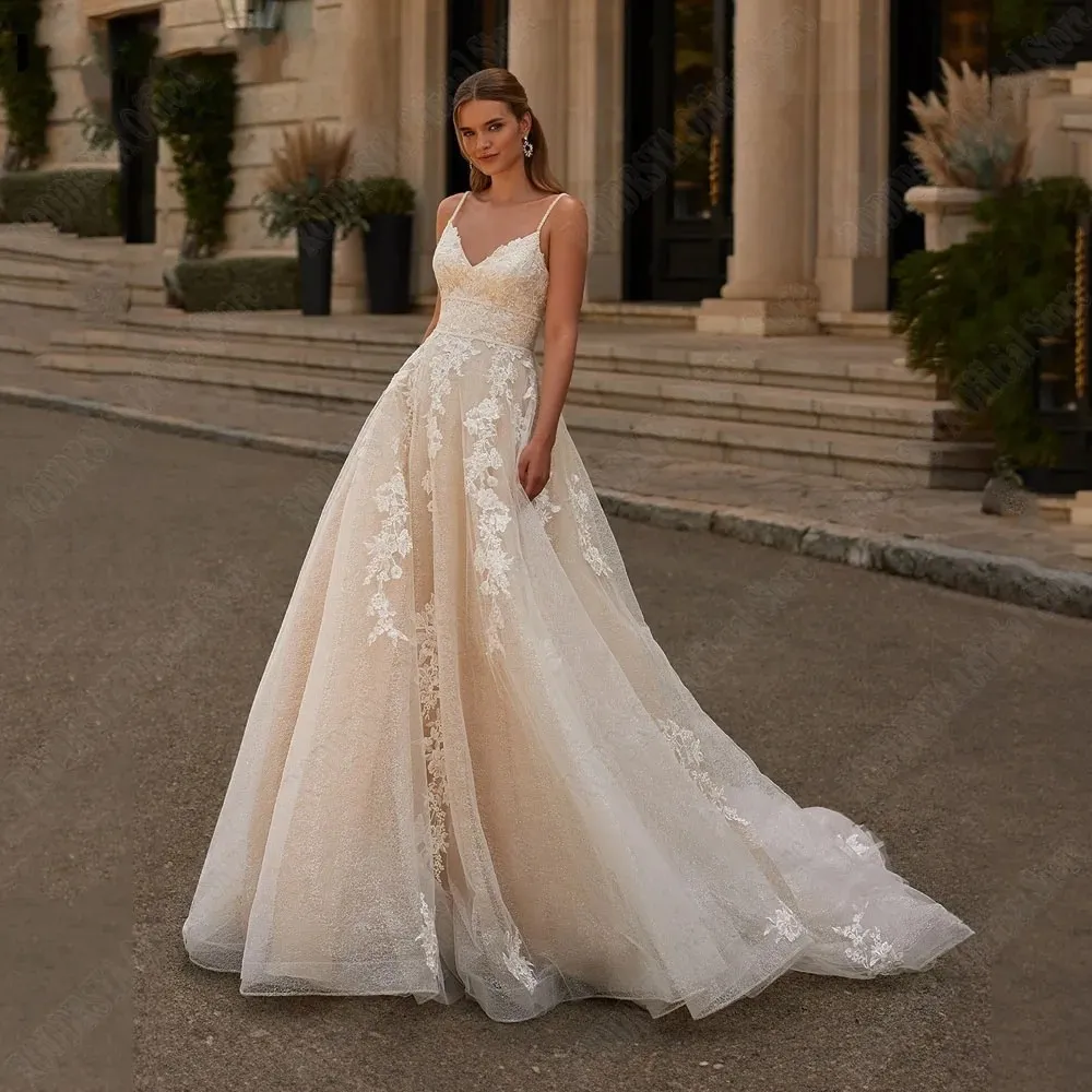 Champagne Lace Applique Line A Wedding Dress with Spaghetti Straps, Backless Design, V-Neckline, and Tulle Skirt - Perfect for The Modern Bride