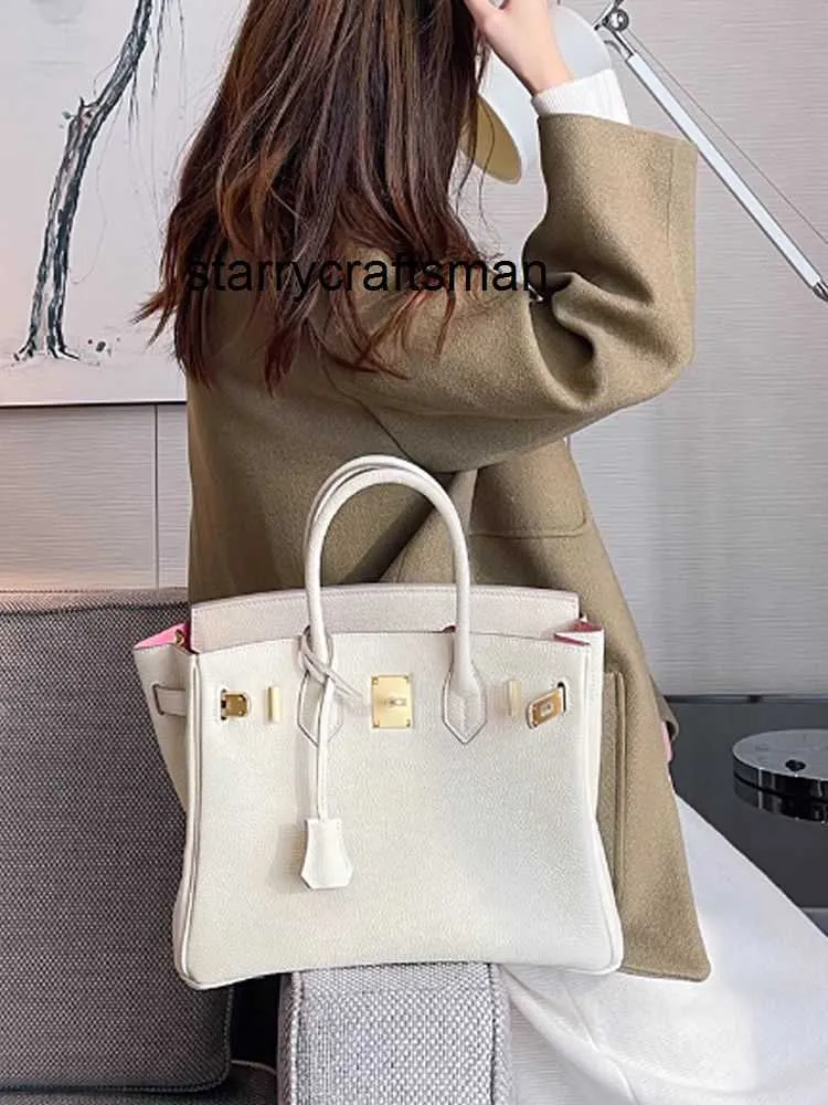 Femmes Luxury Handbag L Couleur Nouveau sac de toile de vache supérieur de haute qualité Togo Sac en cuir véritable