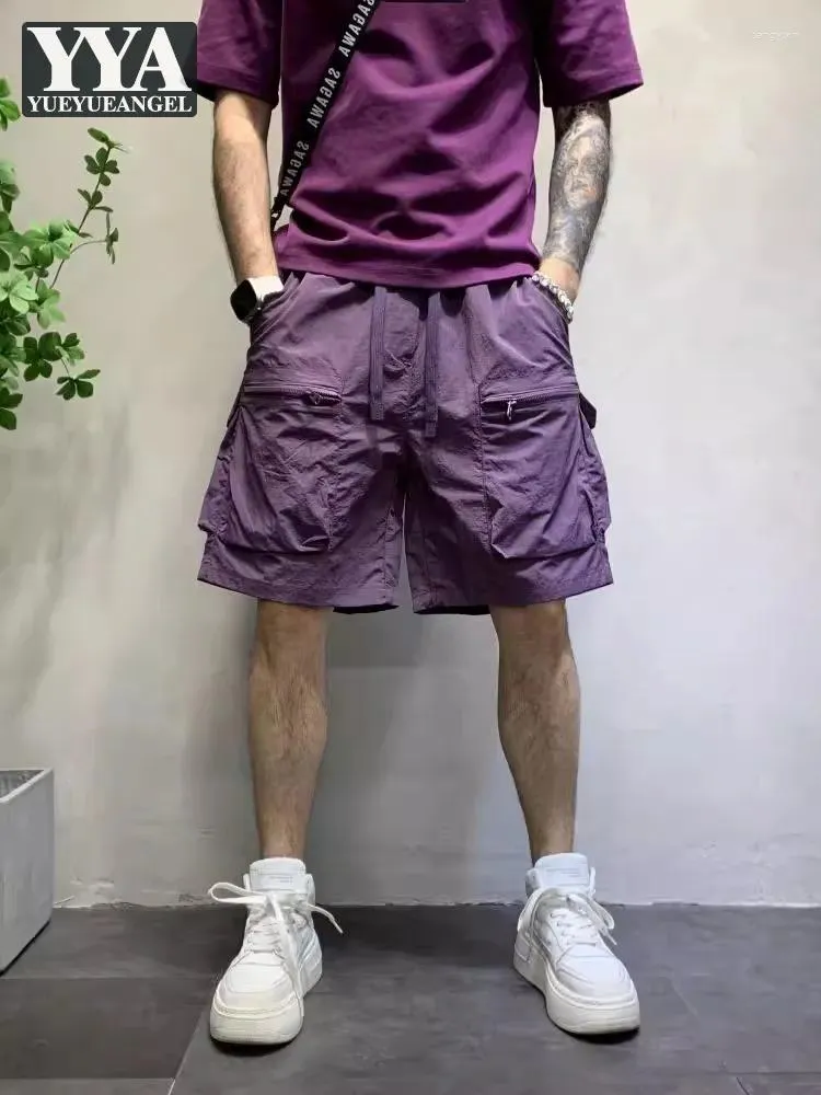 Shorts masculinos masculino masculino grandes bolsos casuais cintura elástica de alcance solto cargo confortável calça de rua cores sólidas