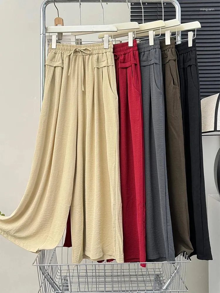 Pantalon féminin 2024 Printemps et été pour femmes vêtements Fashion Lace High Waited Cantrers lâche tous les matchs causaux des dames larges coréen