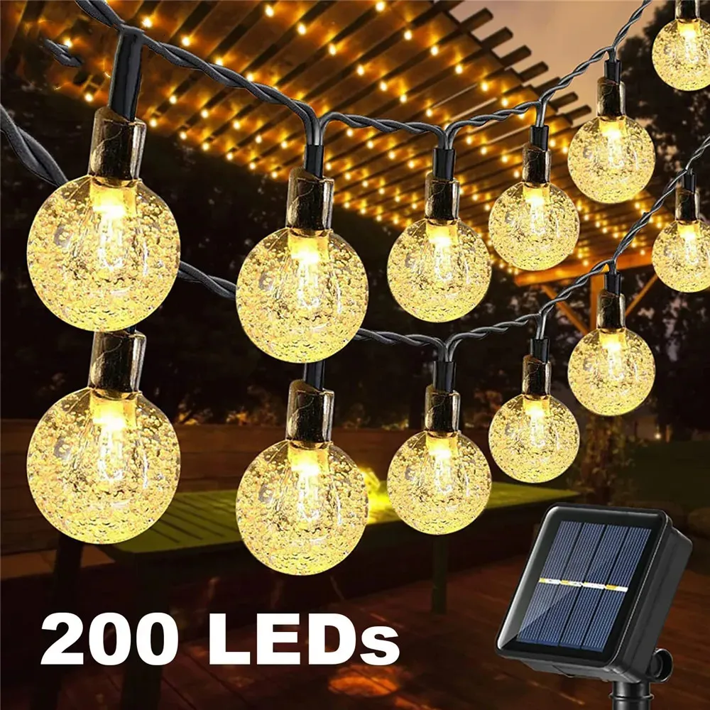 8 lägen Solar Light Crystal Ball 5M7M12M22M LED -stränglampor Fairy Garlands för julfest utomhusdekoration 240411