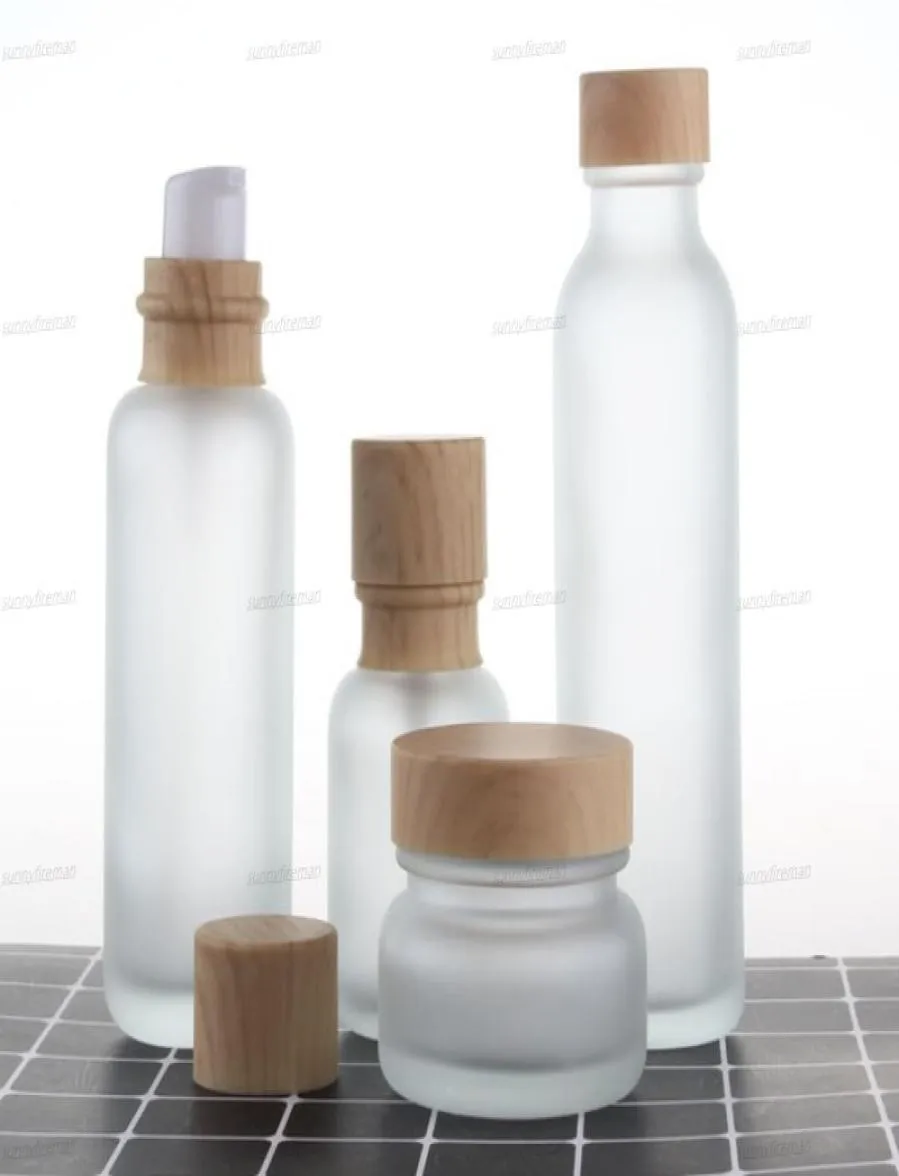 Frosted Glass Jar Lotion Cream Flaskor Runt kosmetiska burkar Hand Face Lotion Pump Bottle With Wood Grain Cap6600592