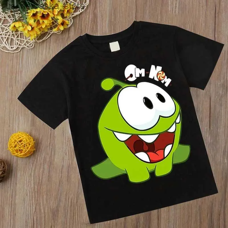 T-shirts Fashion Game om nom t-shirt zomer o-neck t-shirt snijden touw t-shirt baby boy childrens claadcartoon top meisje kikker kleding q240418