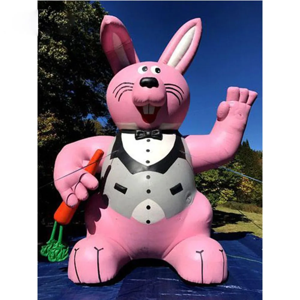 Modèle de lapin rose de lapin de Pâques gonflables en vente en gros avec carotte pour toit extérieur Promotionnel