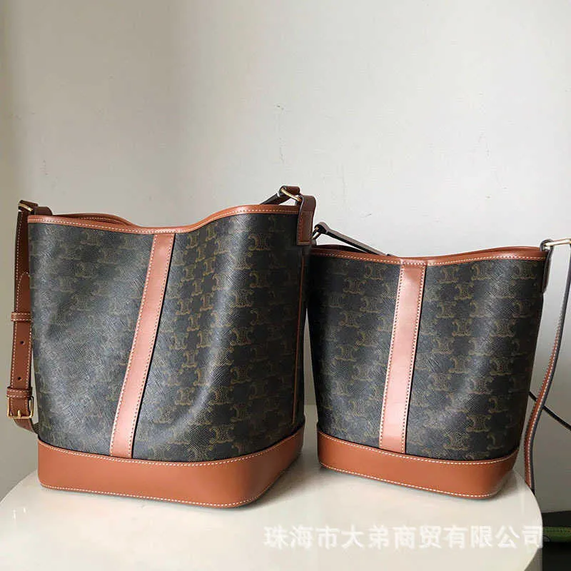 ショルダーバッグ・ポシェット CELINE Clara Triomphe Canvas and leather bucket bag Women's Clara bag in Triomphe canvas and calfskin | CELINE | 24S