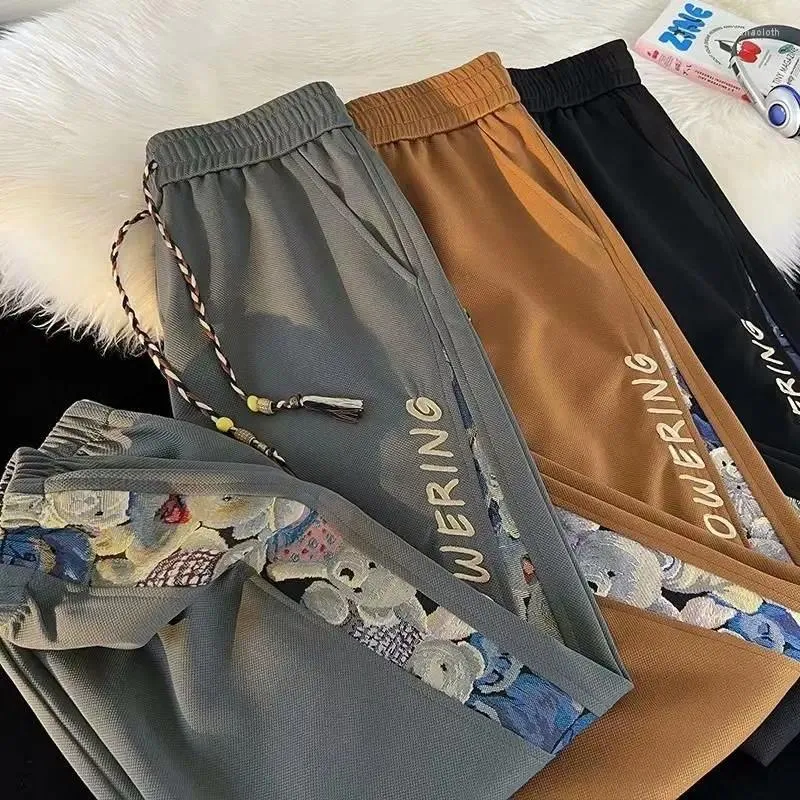 Pantalones para hombres 2024 Moda de primavera pantalones holgados machos streetwear