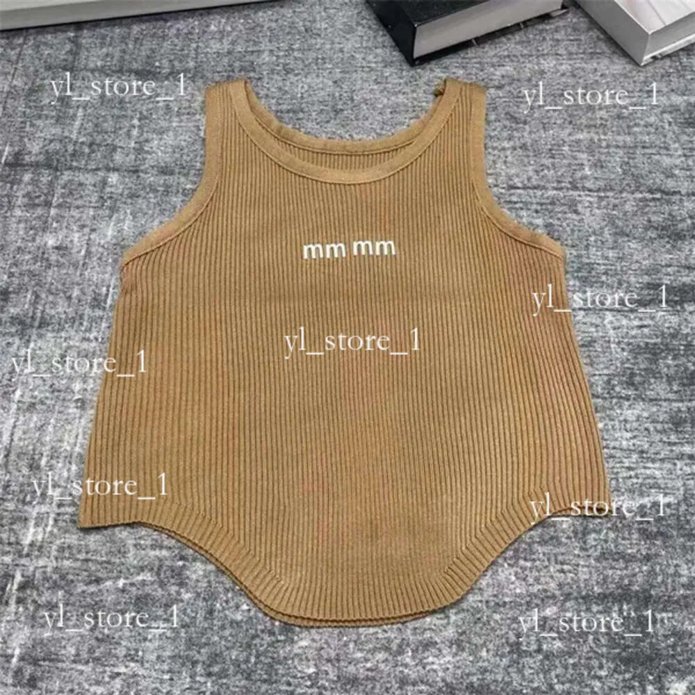 Miui tank top oregelbunden tank top randig stickad väst för kvinnliga ärmlösa stickor t skjortor beskurna tees street stil västar yogasport toppar mui mui skjorta väst 2273