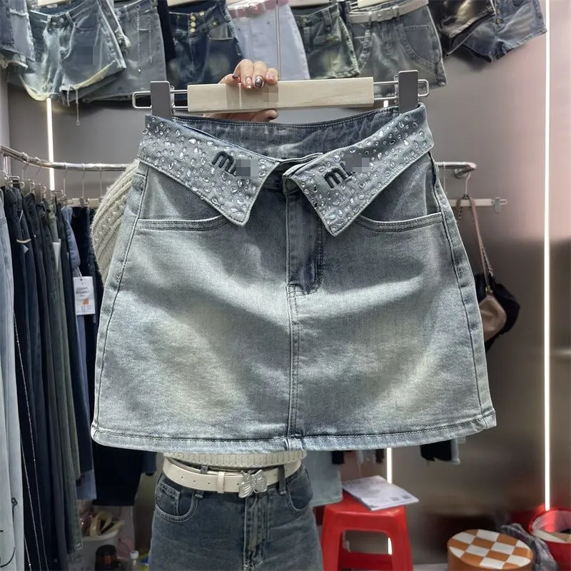 Reversontwerp sense diamant witte denim een woord rok hete meisje korte rok zomer nieuw slank en dun