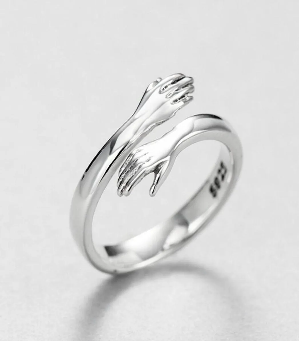 Fashion love hug couple ring brass plating white steel Jane love hug ring opening gift for love whole jewelry9721249