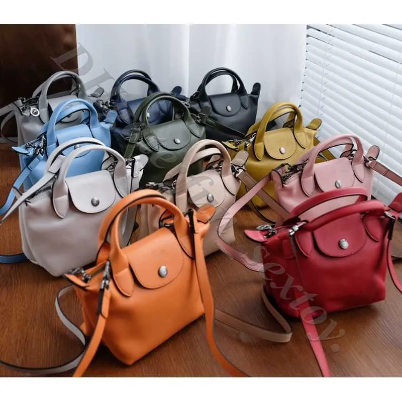 Perakende toptan hamur tatlı cüzdan crossbody mağaza çantaları% 95 kapalı çanta tasarımcısı çanta fransız kuzu derisi çapraz kanat sakcoche çanta kuzu cilt mini çanta t57g