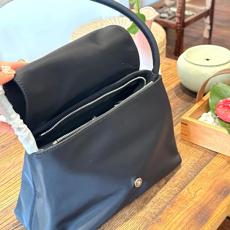 Fashion Designer bag Fashion exquisite low-key luxury with a variety of modeling nylon material fabric simple stylish universal matching size 30cm